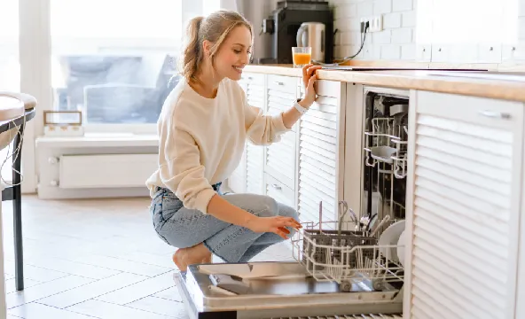 Reasons woman loading dishwasher