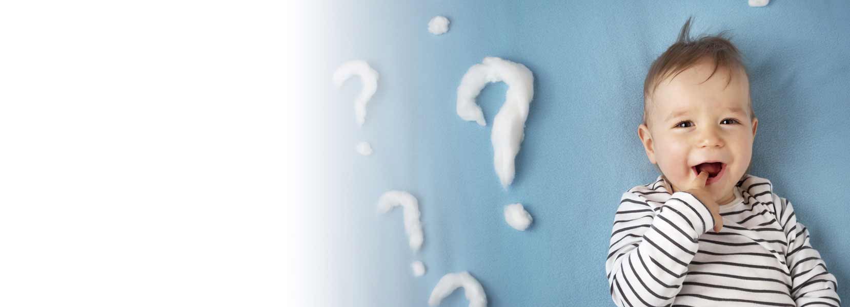 baby with finger in it's mouth with question marks