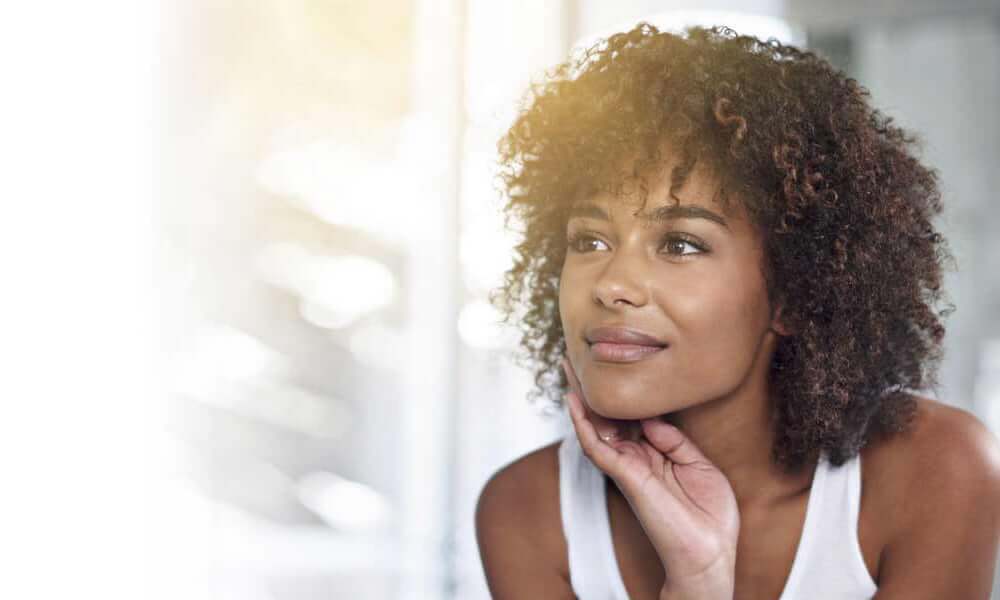 lady looking at herself in mirror