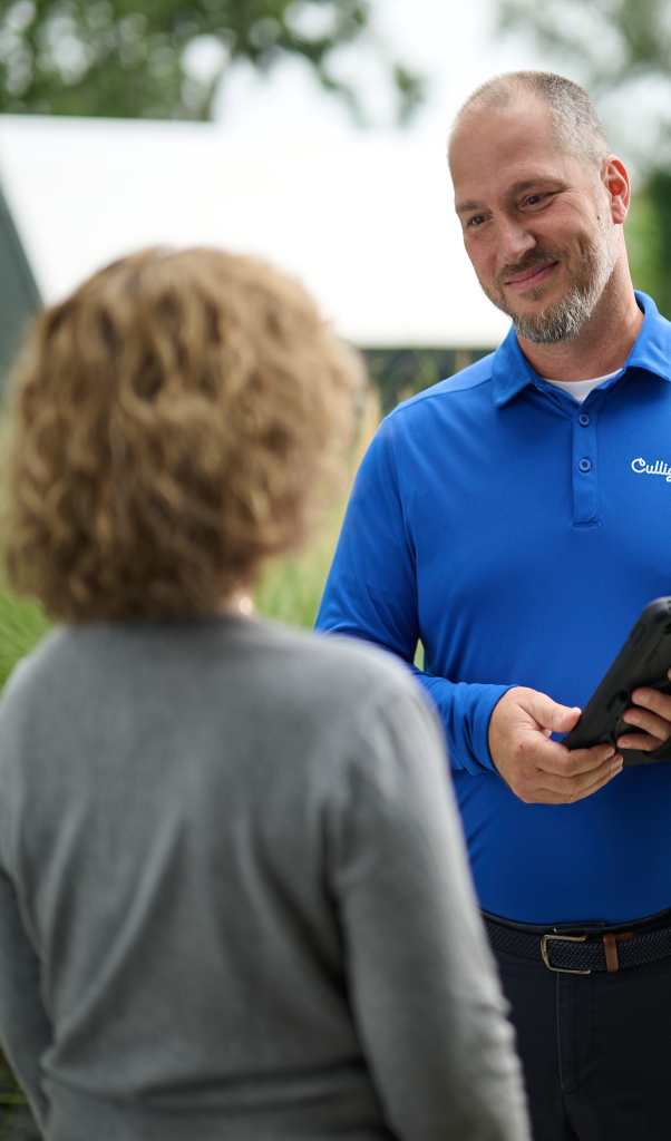 Culligan-engineer-with-lady-outside